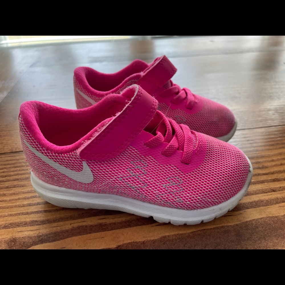 7C pink Nike runners